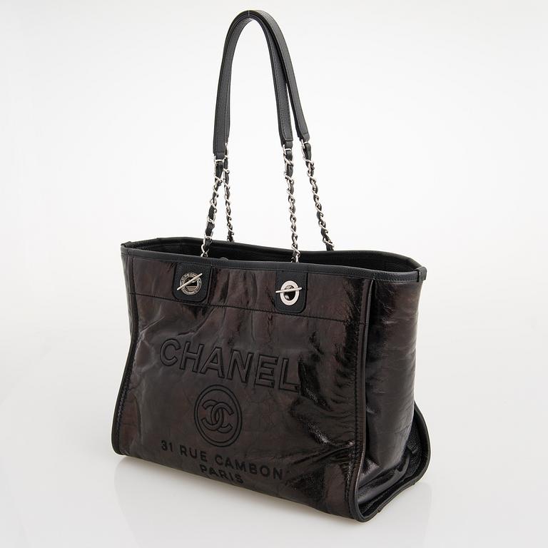 CHANEL, A Large Black Leather Shopping Bag.