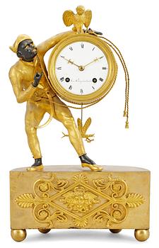 An Empire gilt bronze mantel clock by J. Holmgren.