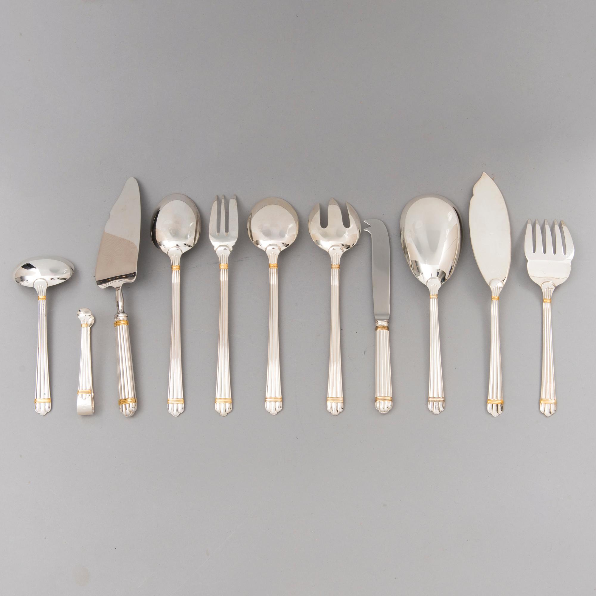 CHRISTOFLE 123-piece Aria Gold Ring Silver Plated Cutlery Set for Twelve persons.