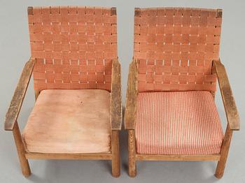 Axel Einar Hjorth, a pair of pine easy chairs, probably model 'Väddö' by Nordiska Kompaniet, Sweden 1930's.