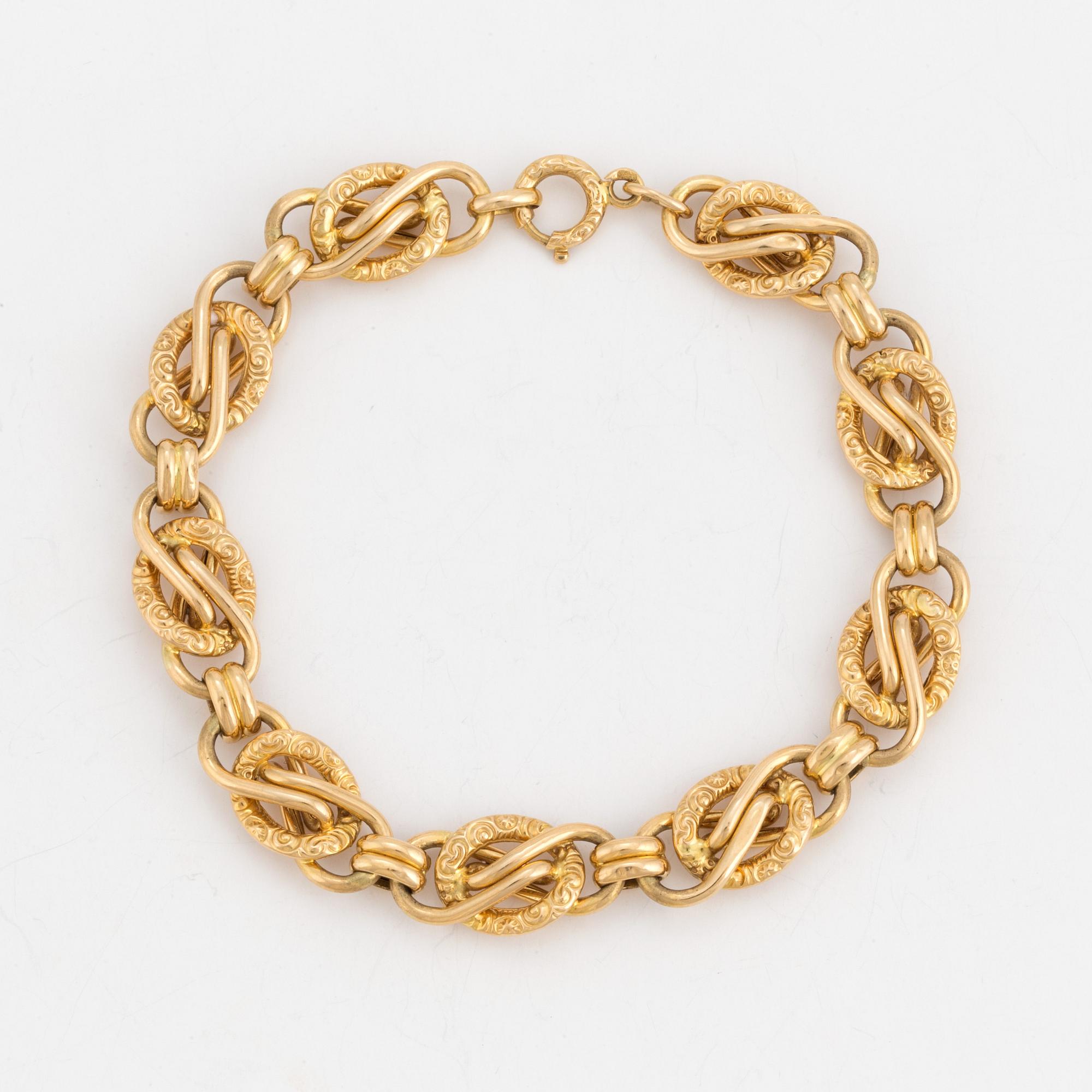 A fancy-link bracelet.