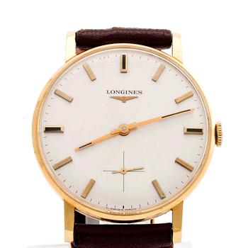 A Longines 18 ct gold wrist watch, ca 32 mm.