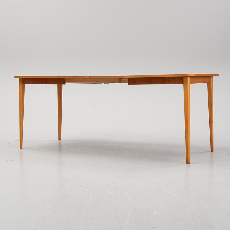 a 1950's/60's teak dining table.