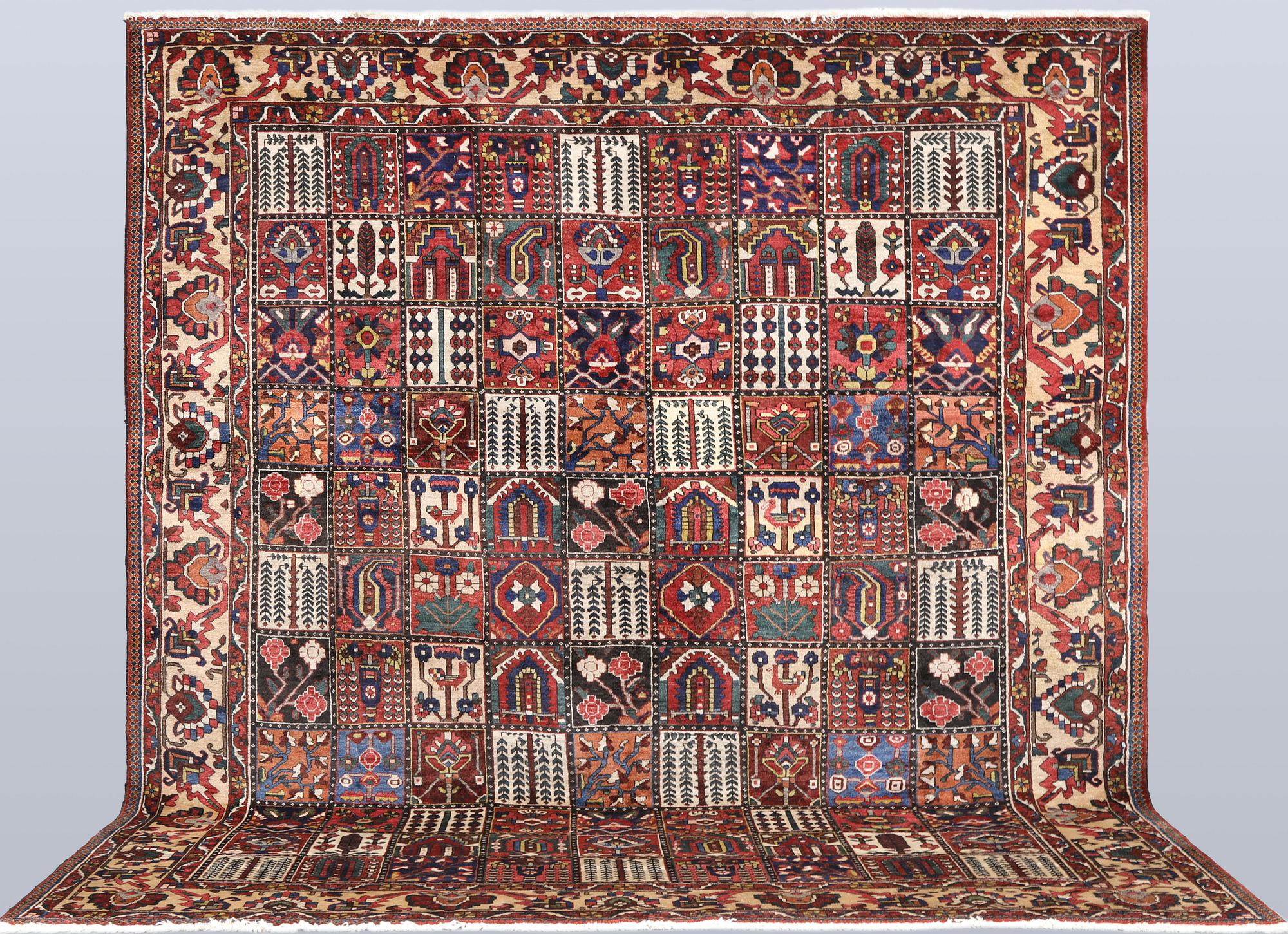A semi-antique Baktiari carpet, approx. 360 x 308 cm.