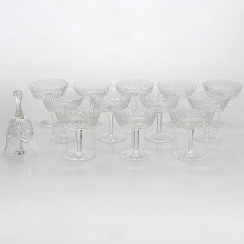A set of 12 dessert bowls / champagnes glasses, Waterford, and a table clock.