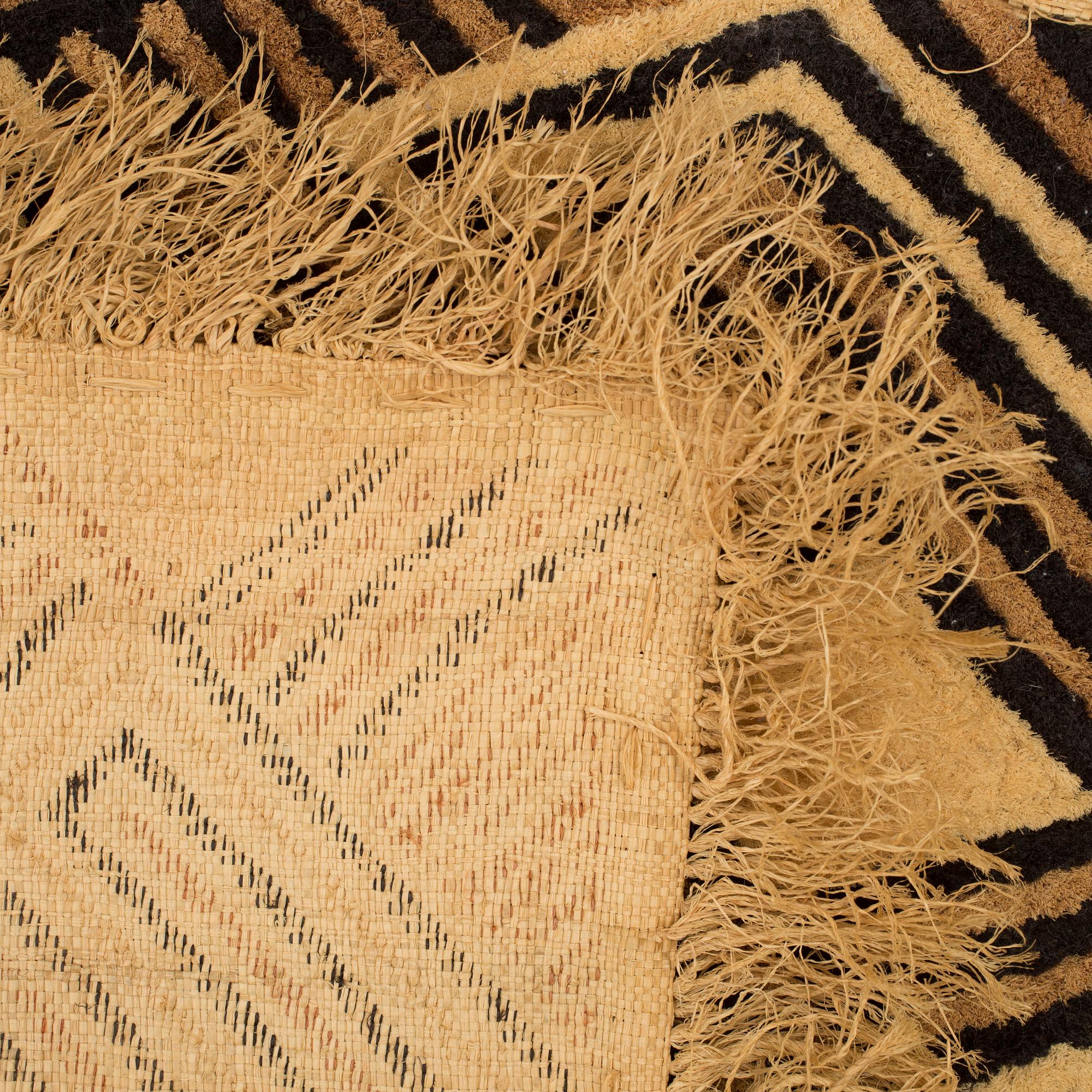 A Cuba raffia textile panel from Congo in the 20th century.