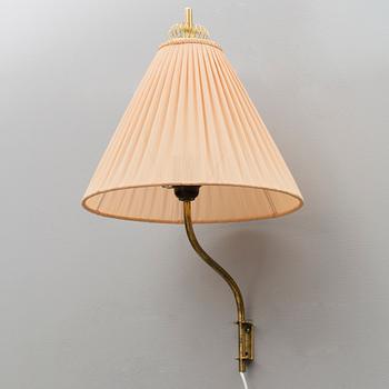 A mid 20th century wall light marked Idman, Finland.