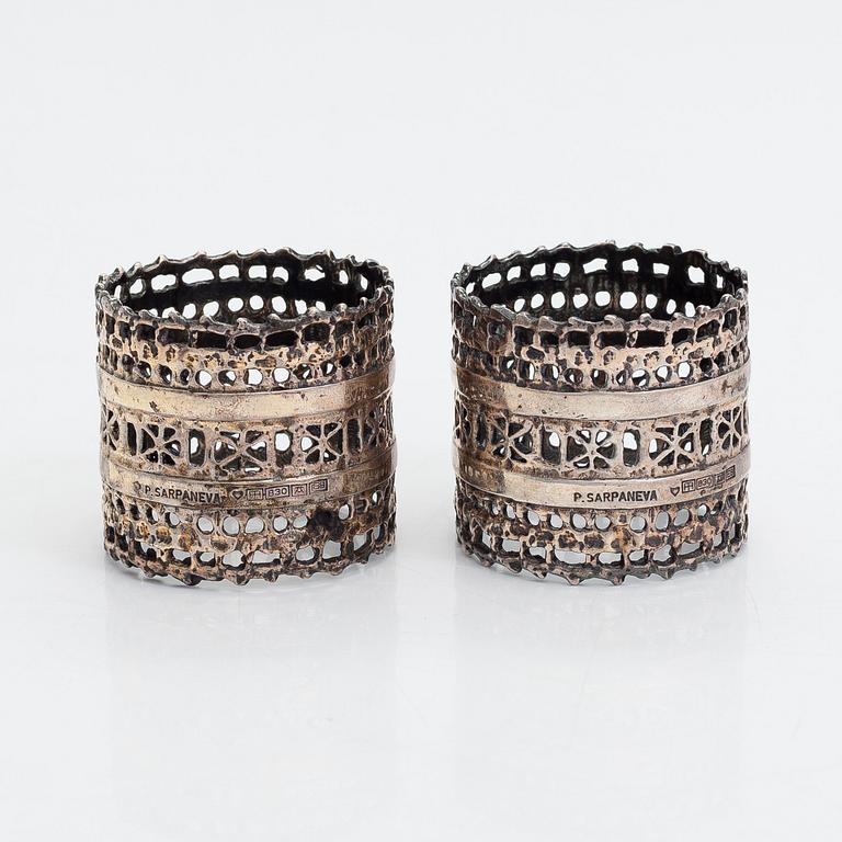 Pentti Sarpaneva, servettringar, 12 st, silver, "Pitsi" (spets), Turun Hopea, Åbo 1982.