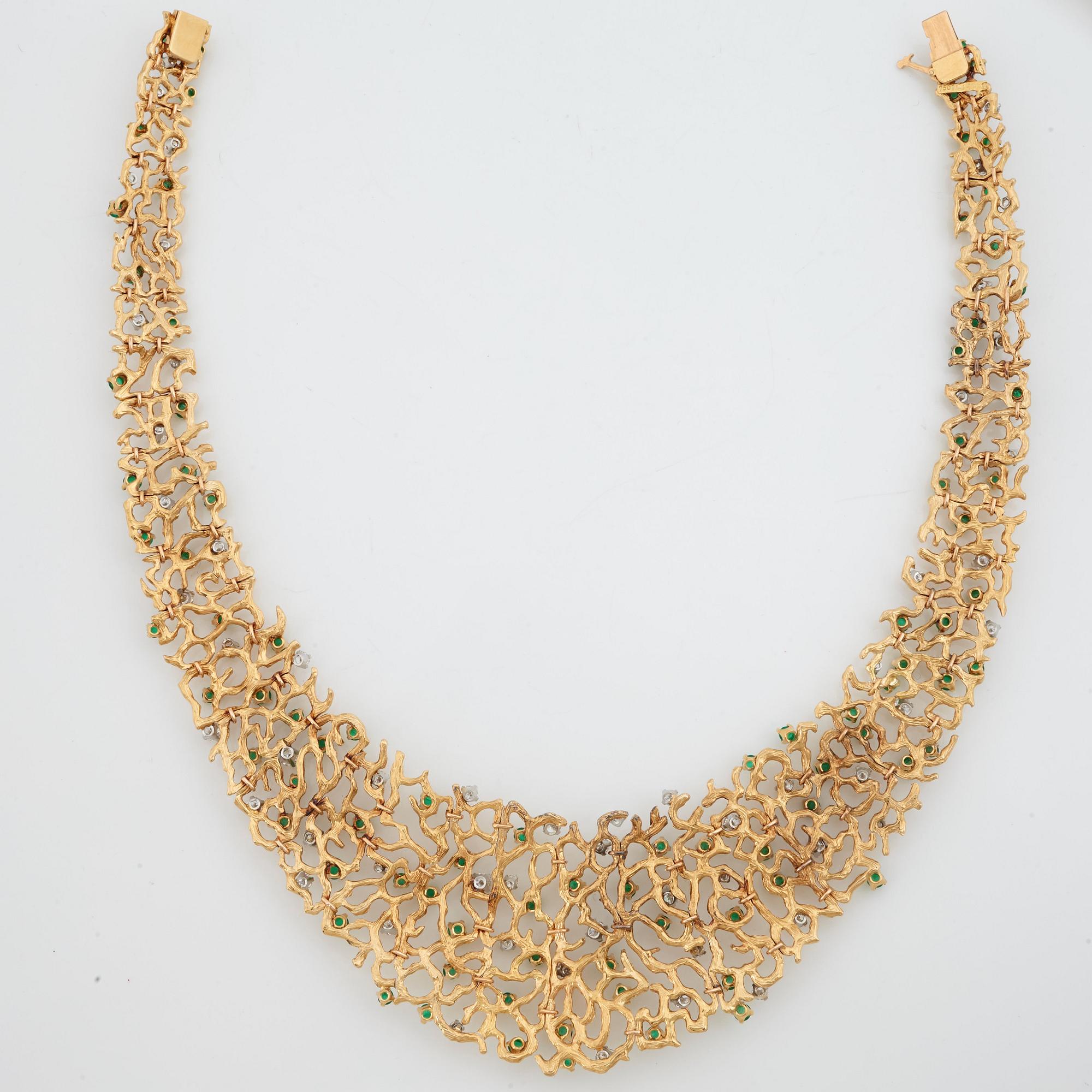 A emerald and brilliant cut diamond necklace by Gilbert Albert, Geneve, Zürich.
