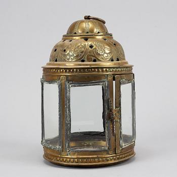 An 18th century brass lantern.
