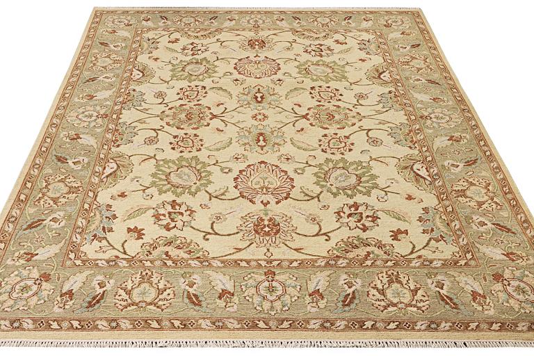 An oriental carpet with Mamluk design, c. 294 x 250 cm.