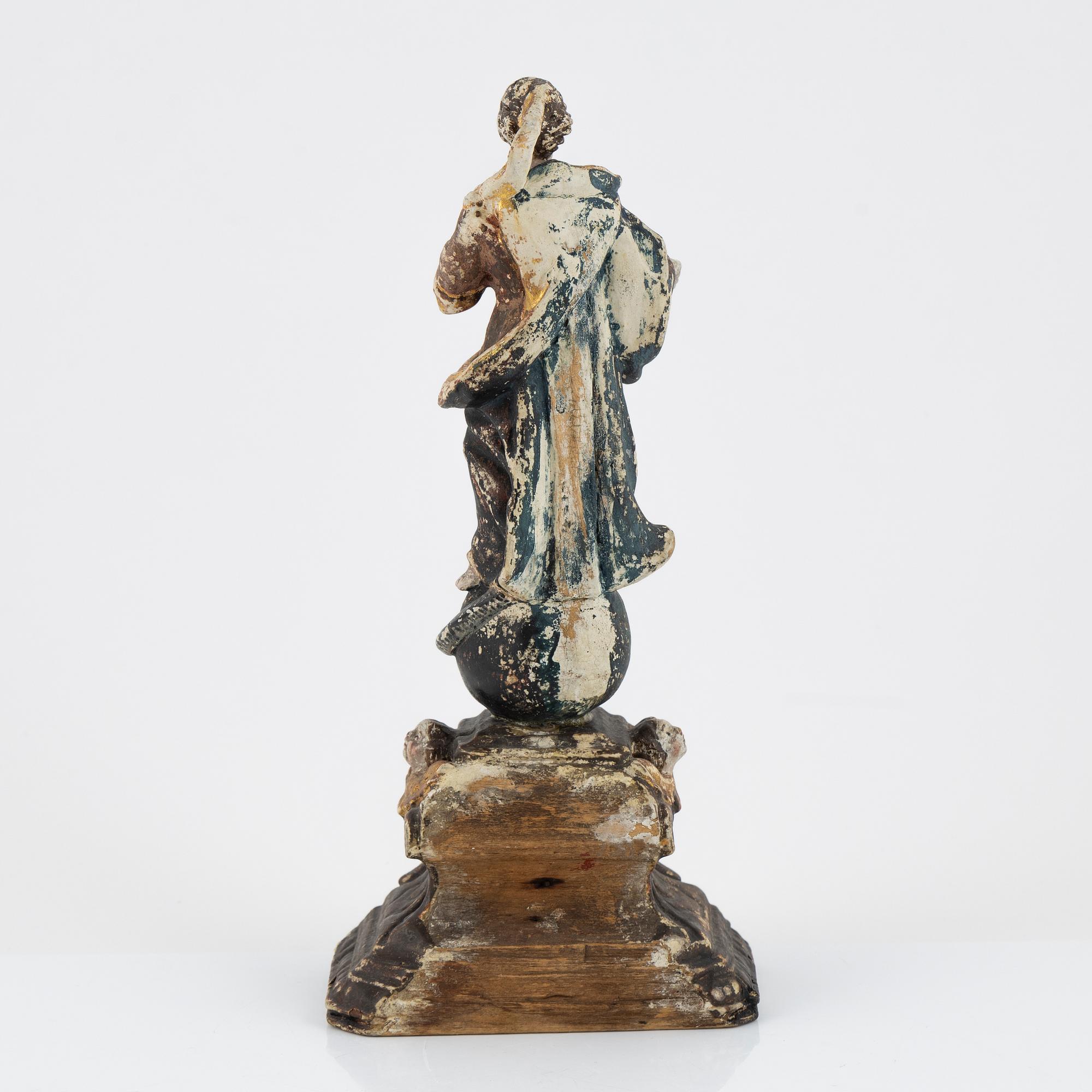 A carved and painted figure of the Virgin Mary crushing the Serpent, Southern Europe, 18th/19th century.
