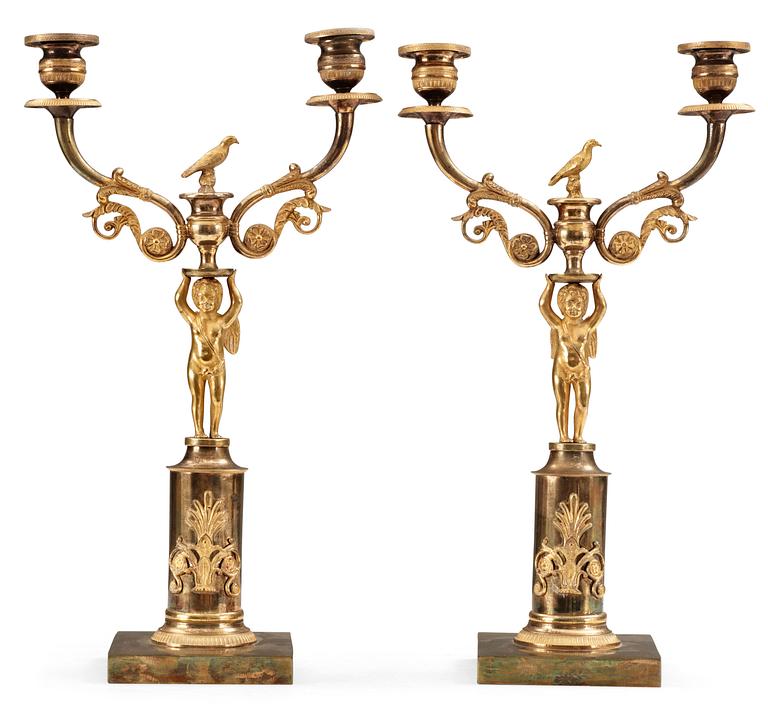 A pair of Swedish Empire gilt bronze two-light candelabra.