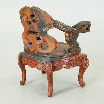 A Japanse arm chair, 20th Century.