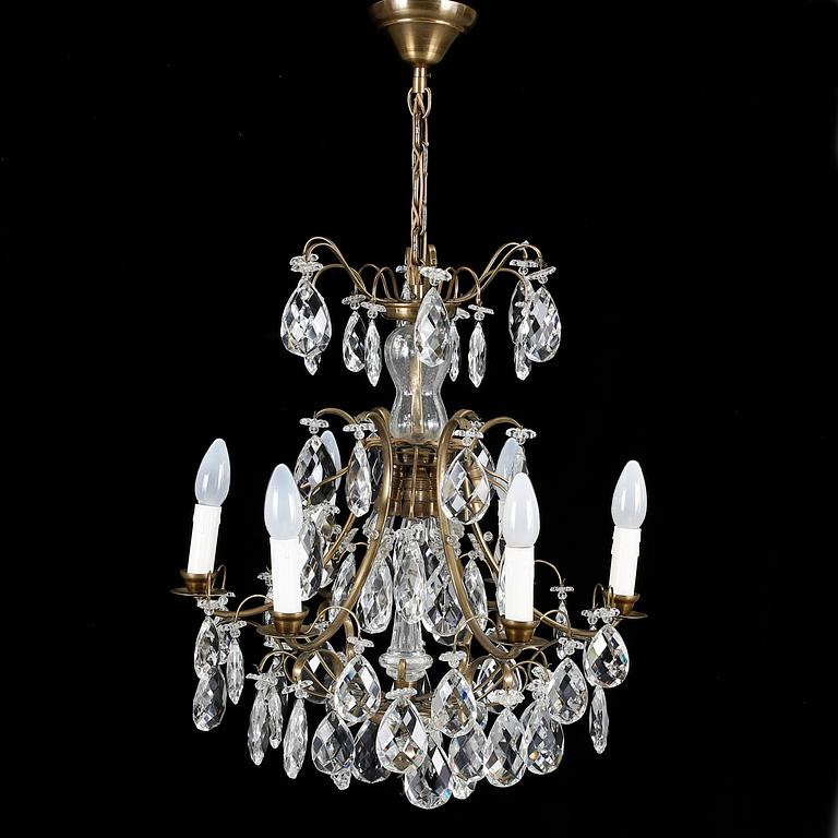 LJUSKRONAN, barockstil, 1900-talets första hälft. Höjd 79 cm.