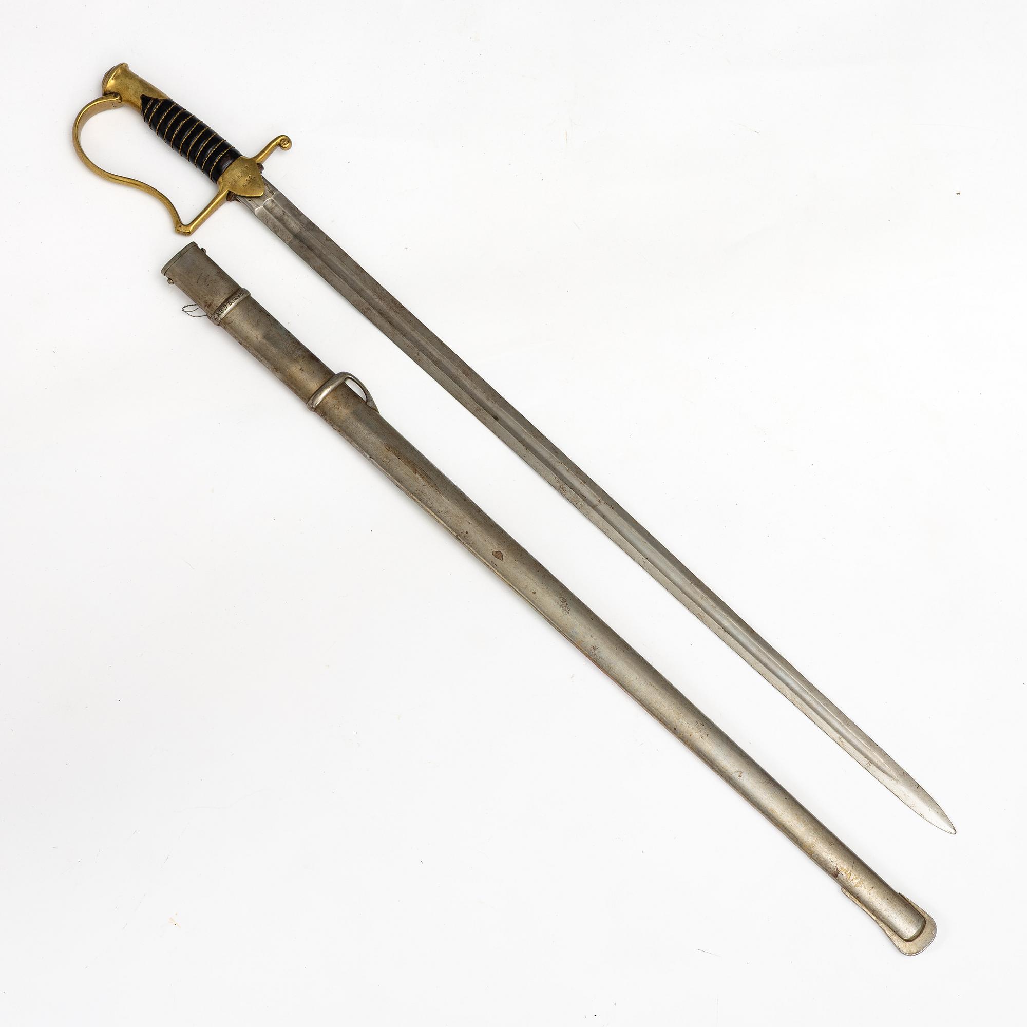 A Swedish artillery saber 1889 pattern with scabbard.