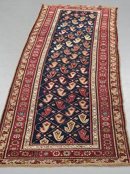Matto, a runner, an antique Karabagh, ca 268,5-278 x 98,5-103,5 cm.