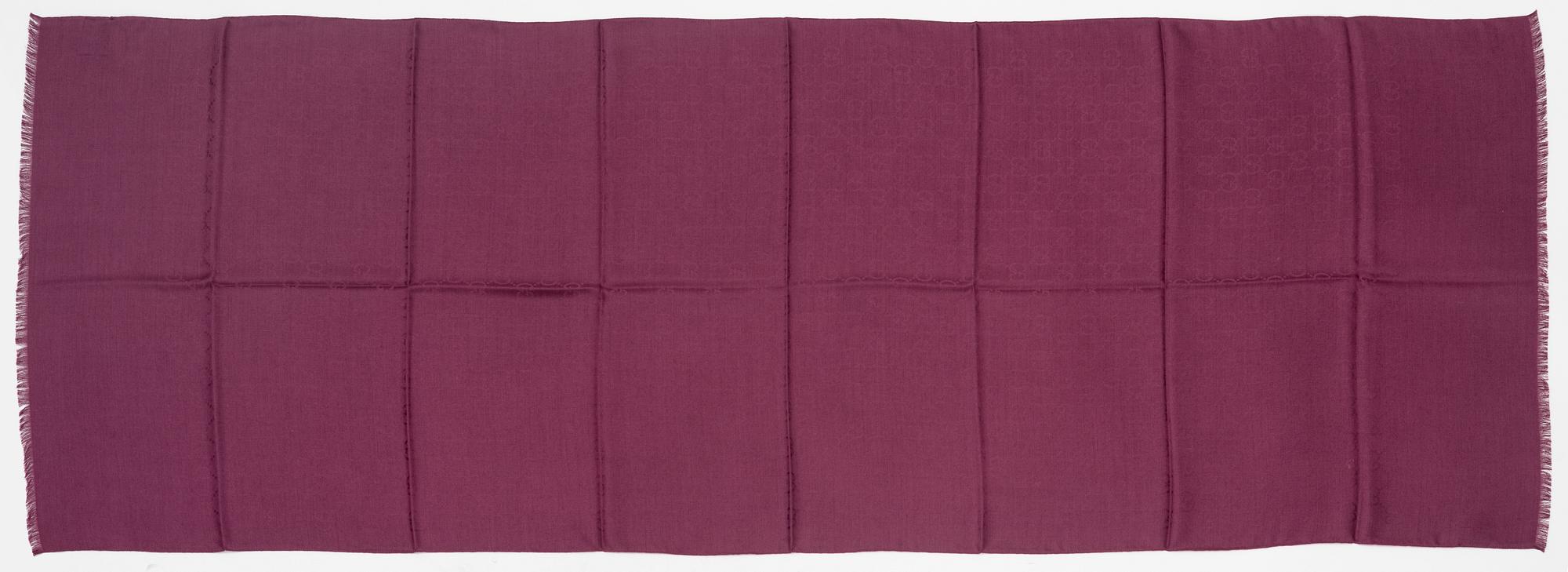 Gucci, a wool and silk mix "GG" jaquard shawl.
