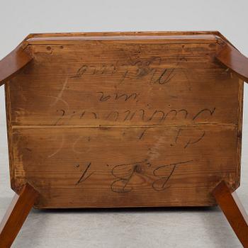 A second half of the 19th century mahogany veneered table.