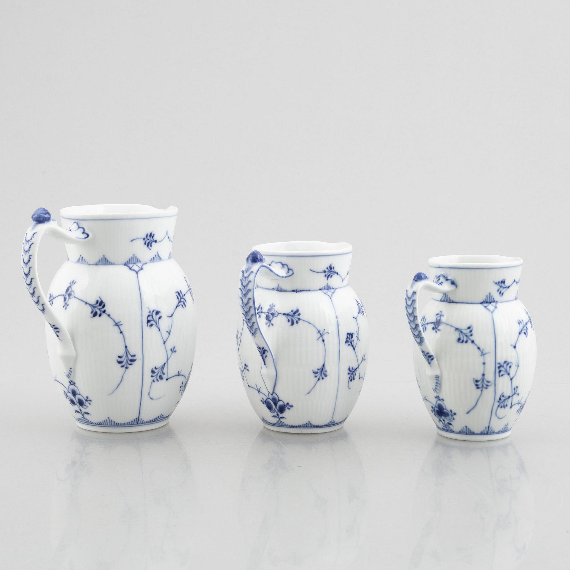 Three 'Blue Fluted' / 'Musselmalet' porcelain milkjugs, Royal Copenhagen, model 159, 450, 459, 1893-1900 and later.