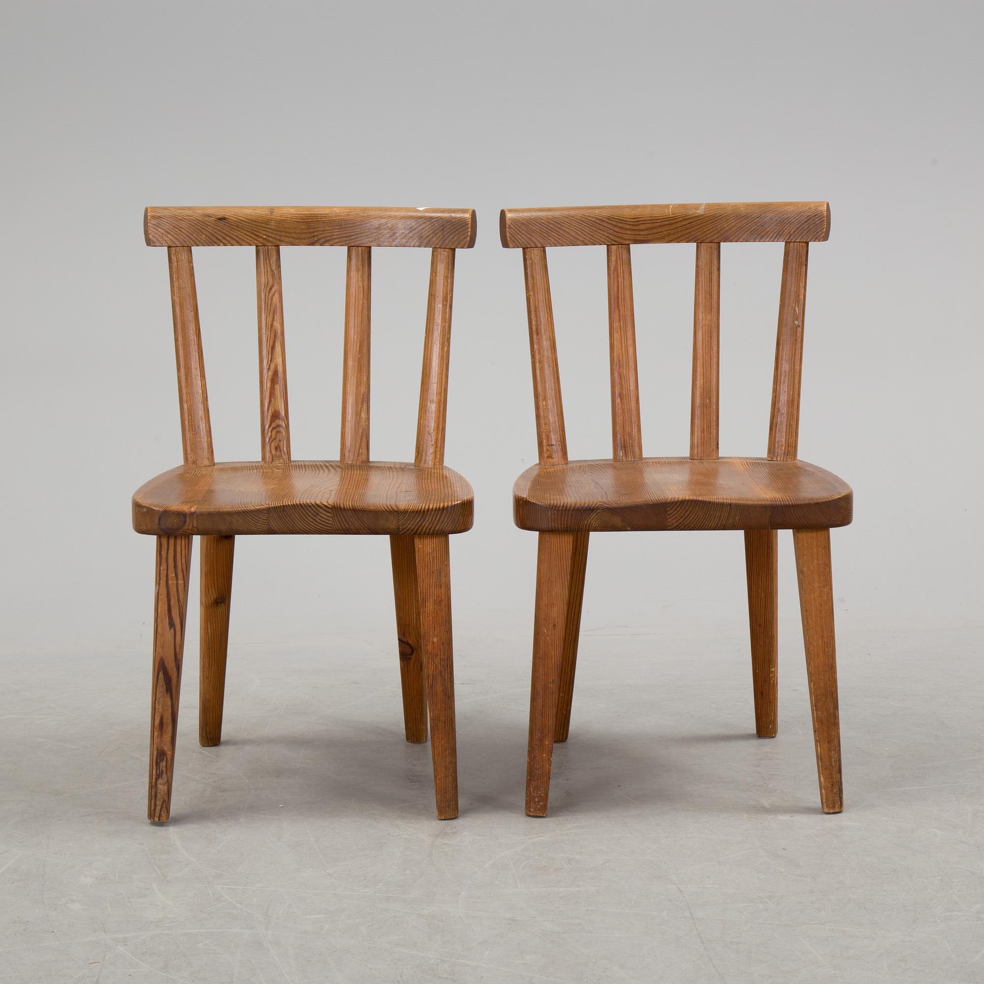 A pair of "Utö" pinewood chairs by Axel Einar Hjorth in the 1930's.