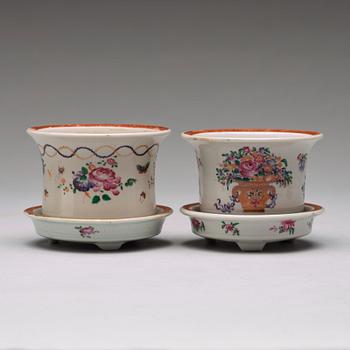 A set of four (2+2) famille rose flower pots with stands, Qing dynasty, Qianlong (1736-95).