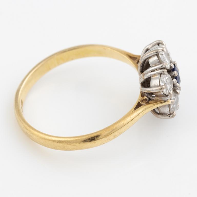 Ring, 18K gold with sapphire and brilliant-cut diamonds.