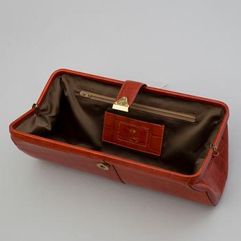 A leather clutch by Mulberry.