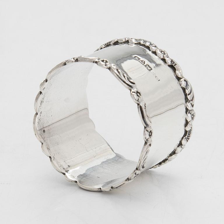 A sterling silver egg cup and napkin ring in original fitted case, Chester 1909.