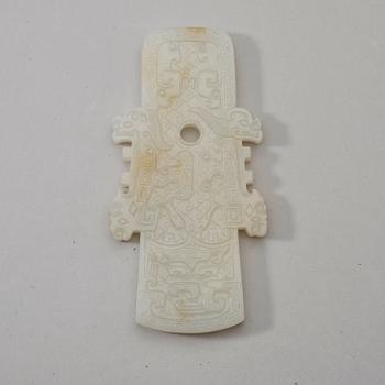 An archaistic nephrite plaque, China.