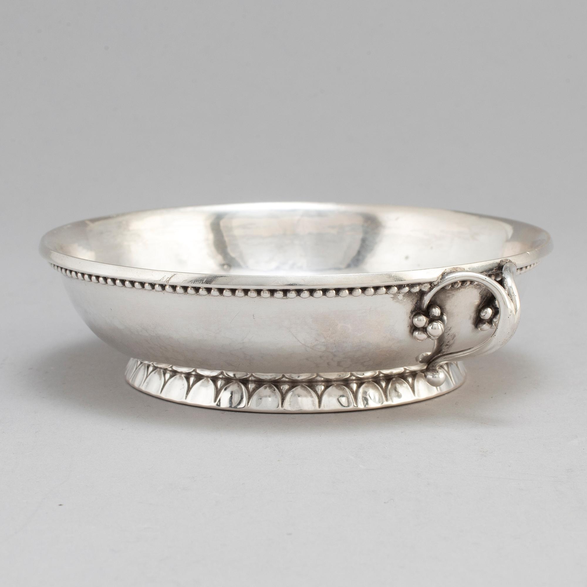 GEORG JENSEN,  a 830/1000 silver mug and  a bowl (a christening set), Copenhagen ca 1918-1927, design nr 127, 158.
