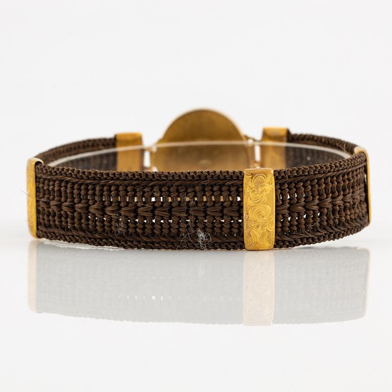 Armband hårarbete och 14K guld.