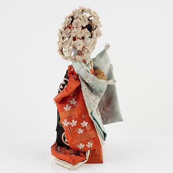 A Japanese doll, early 20th Century.