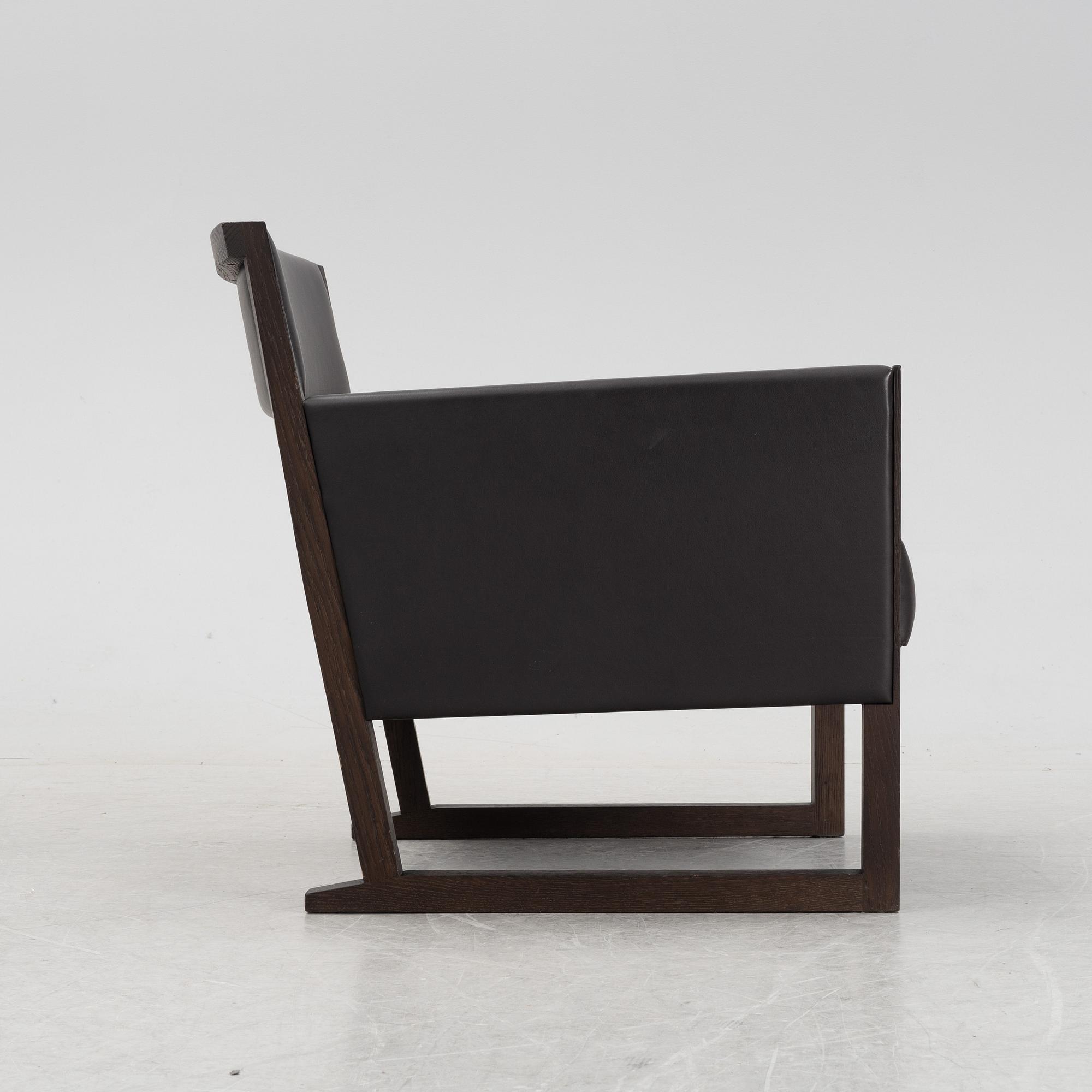 A 'Musa' easy chair by Antonio Citterio for Maxalto, designed 2006.