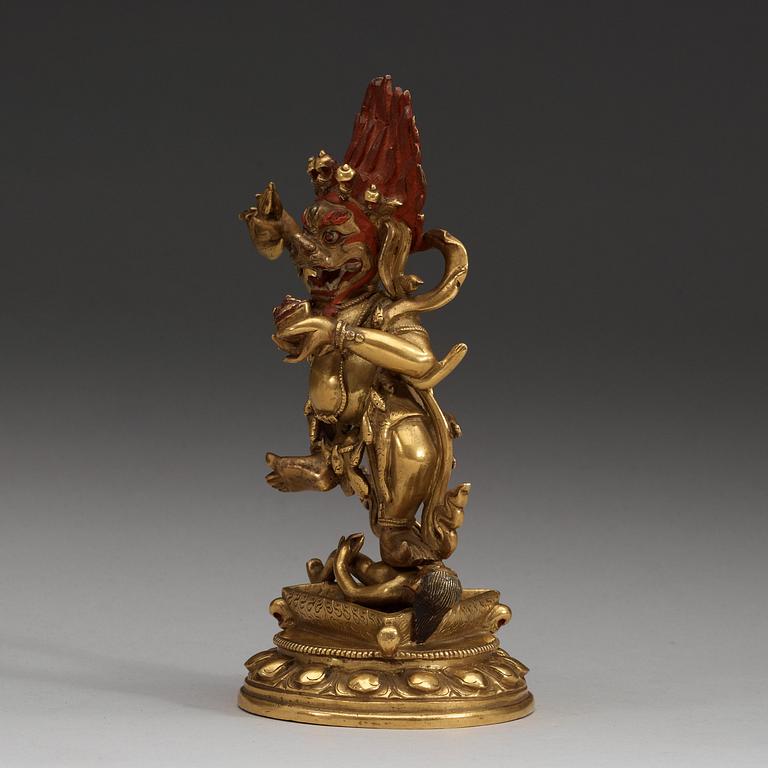 A Sinotibetan lacquered and gilt bronze figure of Takini Sinihavaktra, Qing dynasty, 19th Century or older.