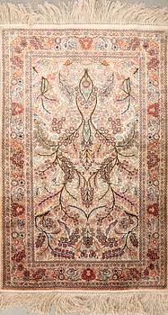 Oriental silk rug, approximately 122x77 cm.