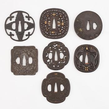 Seven tsuba of different origin, 18th - 20th Century.
