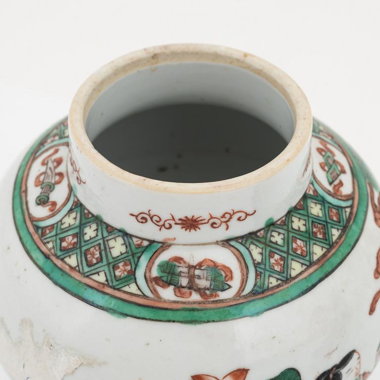 A Chinese dinner plate and a Japanese imari bowl, 18th Century together with a Chinese 19th Century jar with cover.