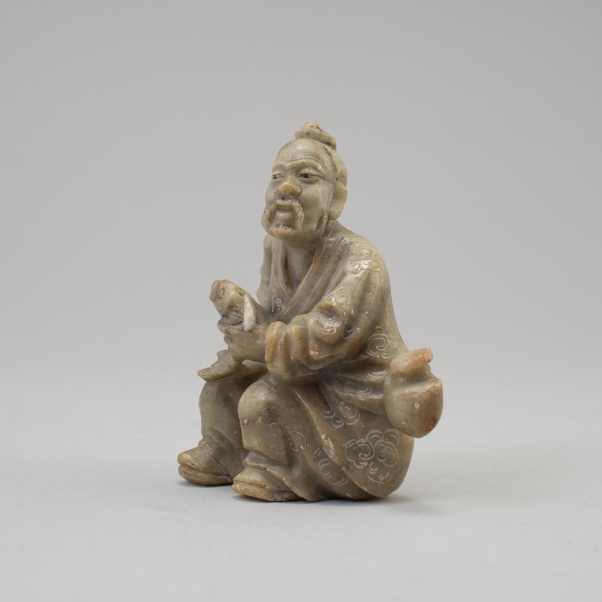 Three chinese 20th century nephrite and stone sculptures.