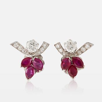 914. A pair of 18K white gold earrings set with faceted pink sapphires and round- and eight-cut diamonds.