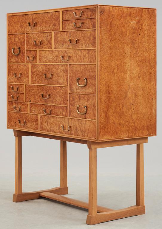 A Josef Frank burrwood, mahogany and walnut cabinet, Svenskt Tenn, model 881.