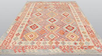 A carpet Kilim, ca 290 x 214 cm.