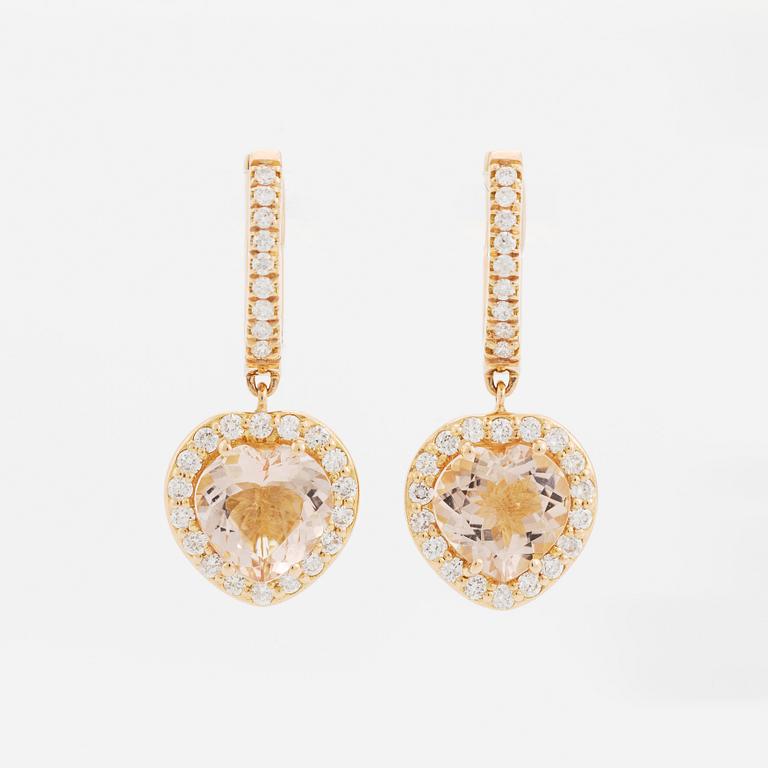 Heart shaped morganite and brilliant cut diamond earrings.