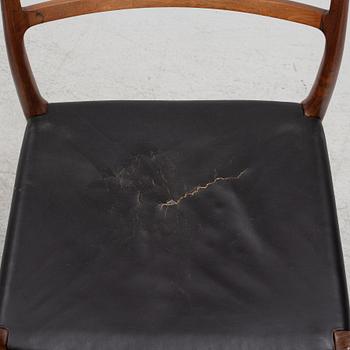 Niels Otto Møller, a rosewood dining table and eight rosewood chairs, Poul Jeppesen & JL Möller, Denmark, 1960's.