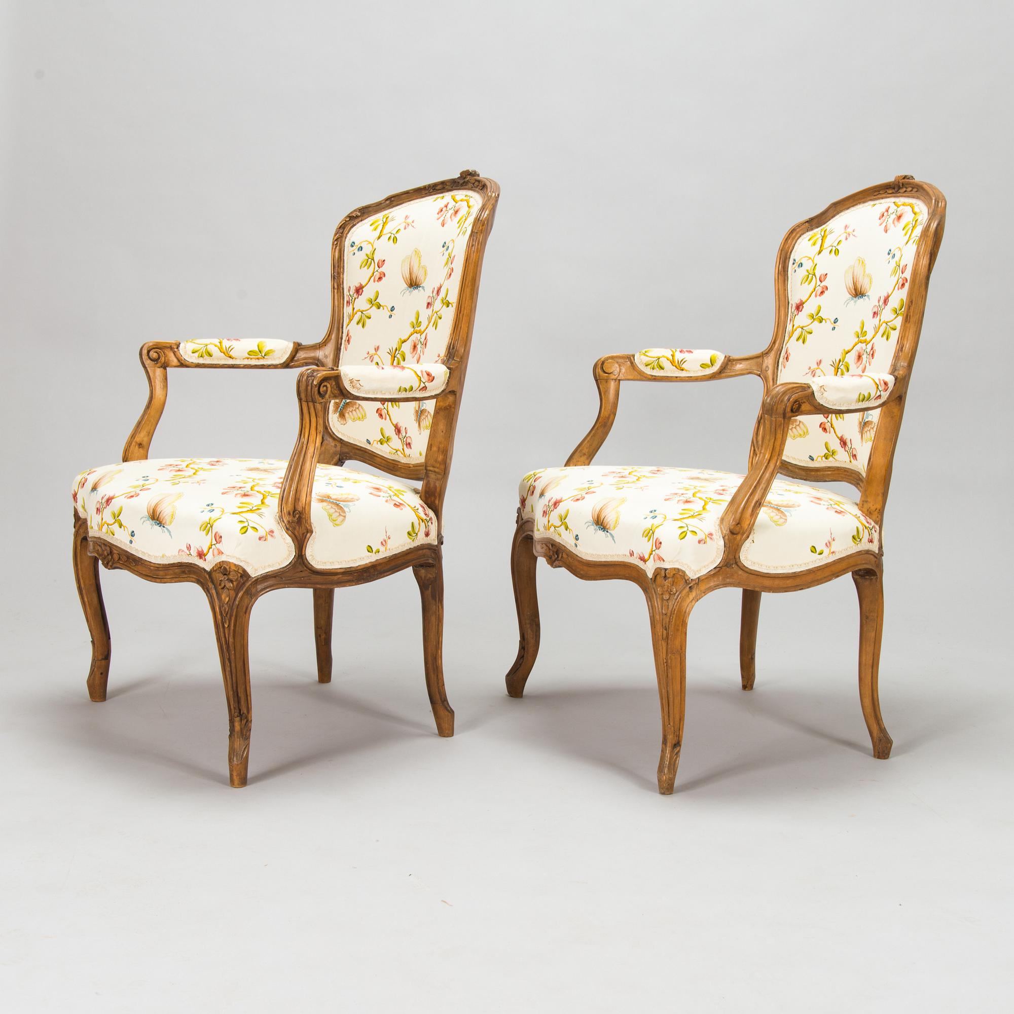 Two French, mid-18th-century Louis XV open armchairs.