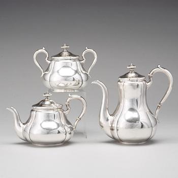 A Russian silver 3 piece tea-/coffee-set + 1, mark of Sazikov, Moscow 1862, basket marked Adam Markula, St Petersburg.