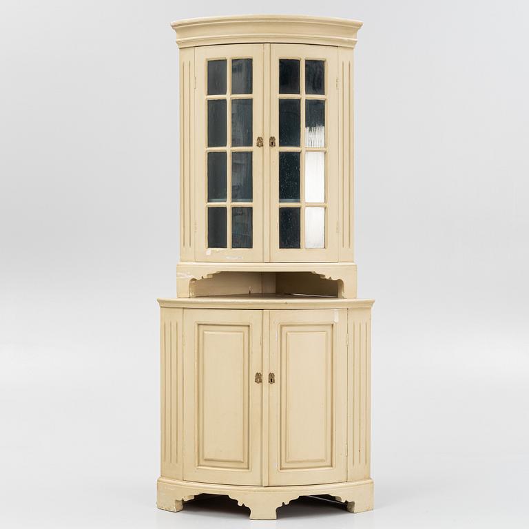 A Gustavian style corner cabinet, first half of the 20th Century.
