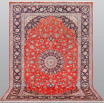 A Kashan carpet, c 297 x 194 cm.