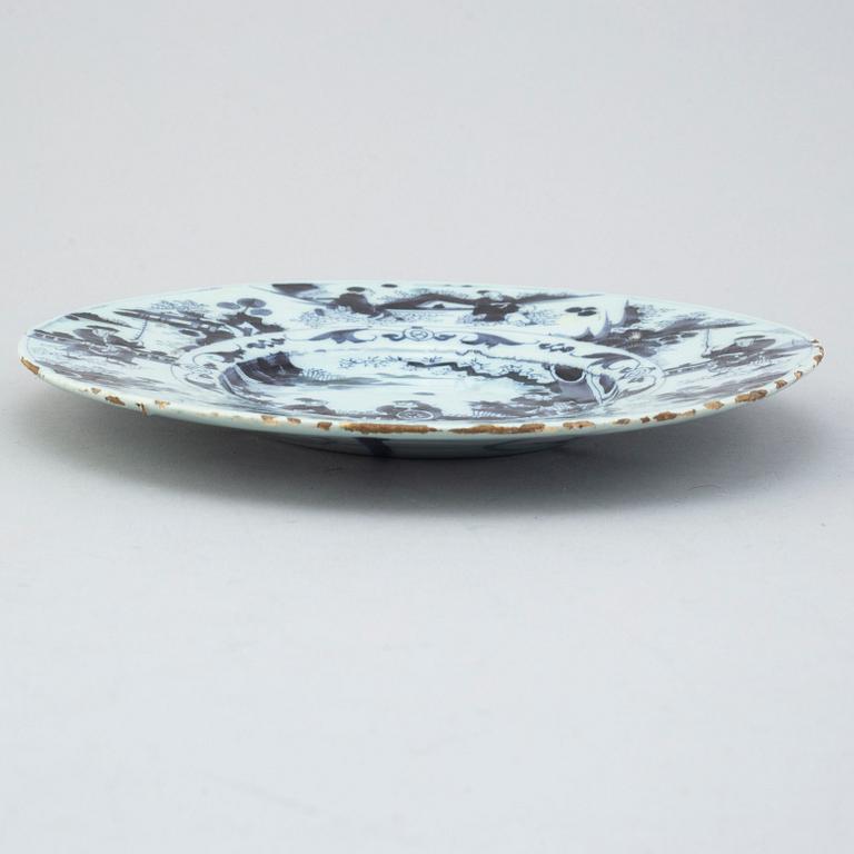 A Delft faiance dish, 18th century.