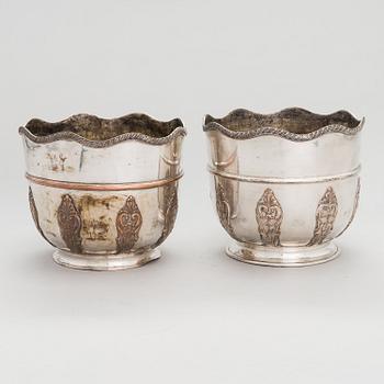 A pair of 19th-century English champagne cooler buckets.